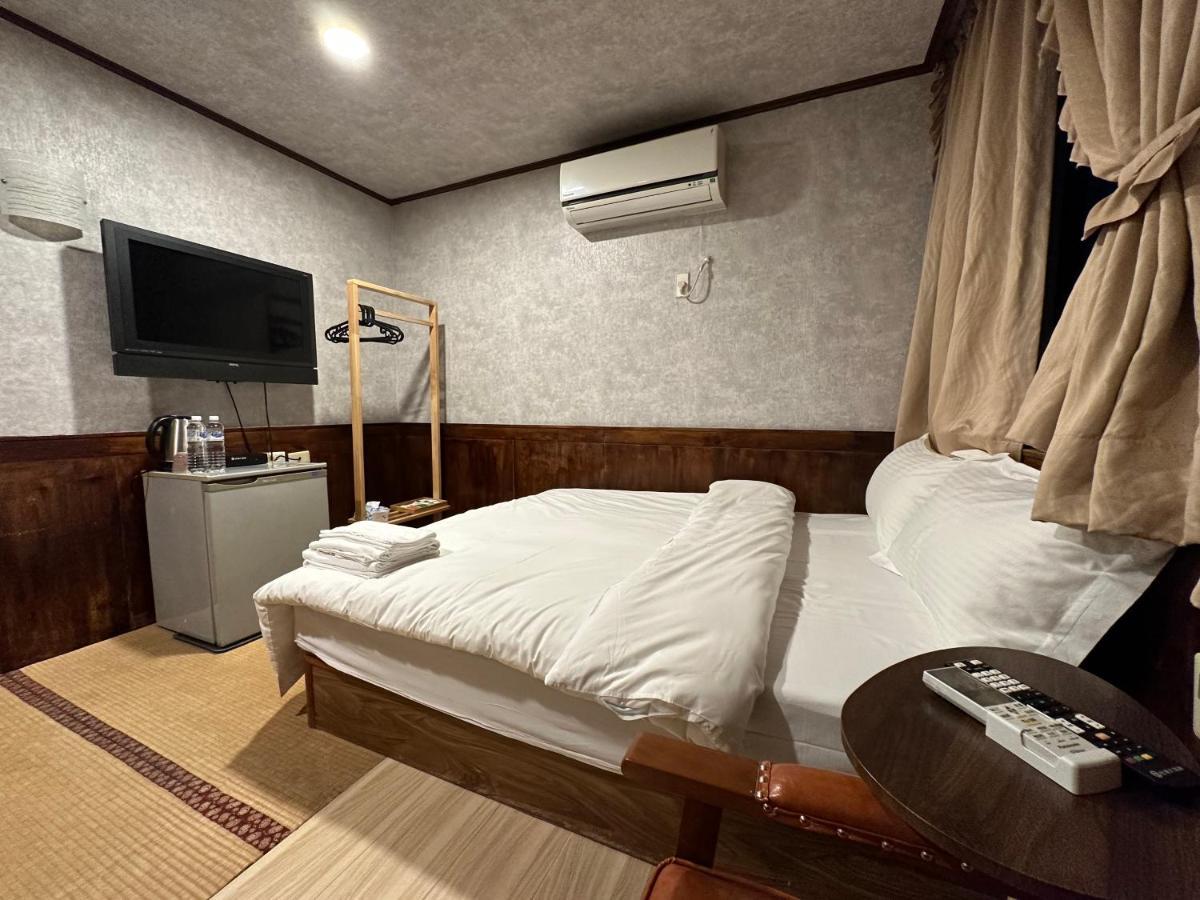 Ming Ren Hotspring Hotel Цзяоси Экстерьер фото